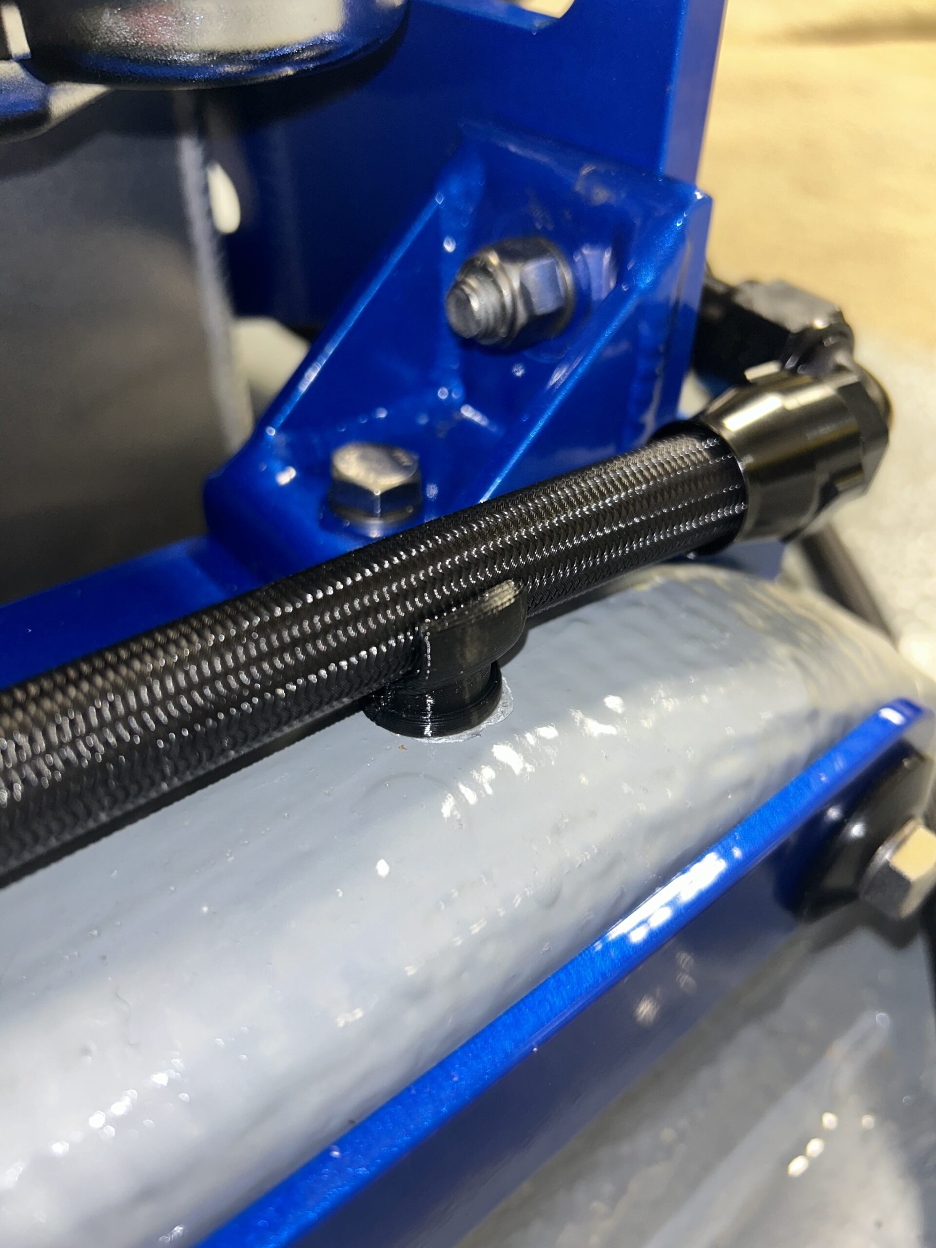 Custom 3D printed AN hose bracket for boats